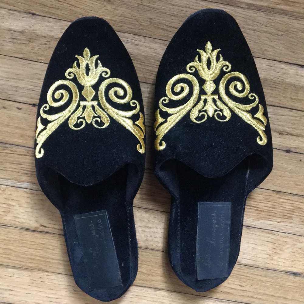 Black slippers with gold embroidery